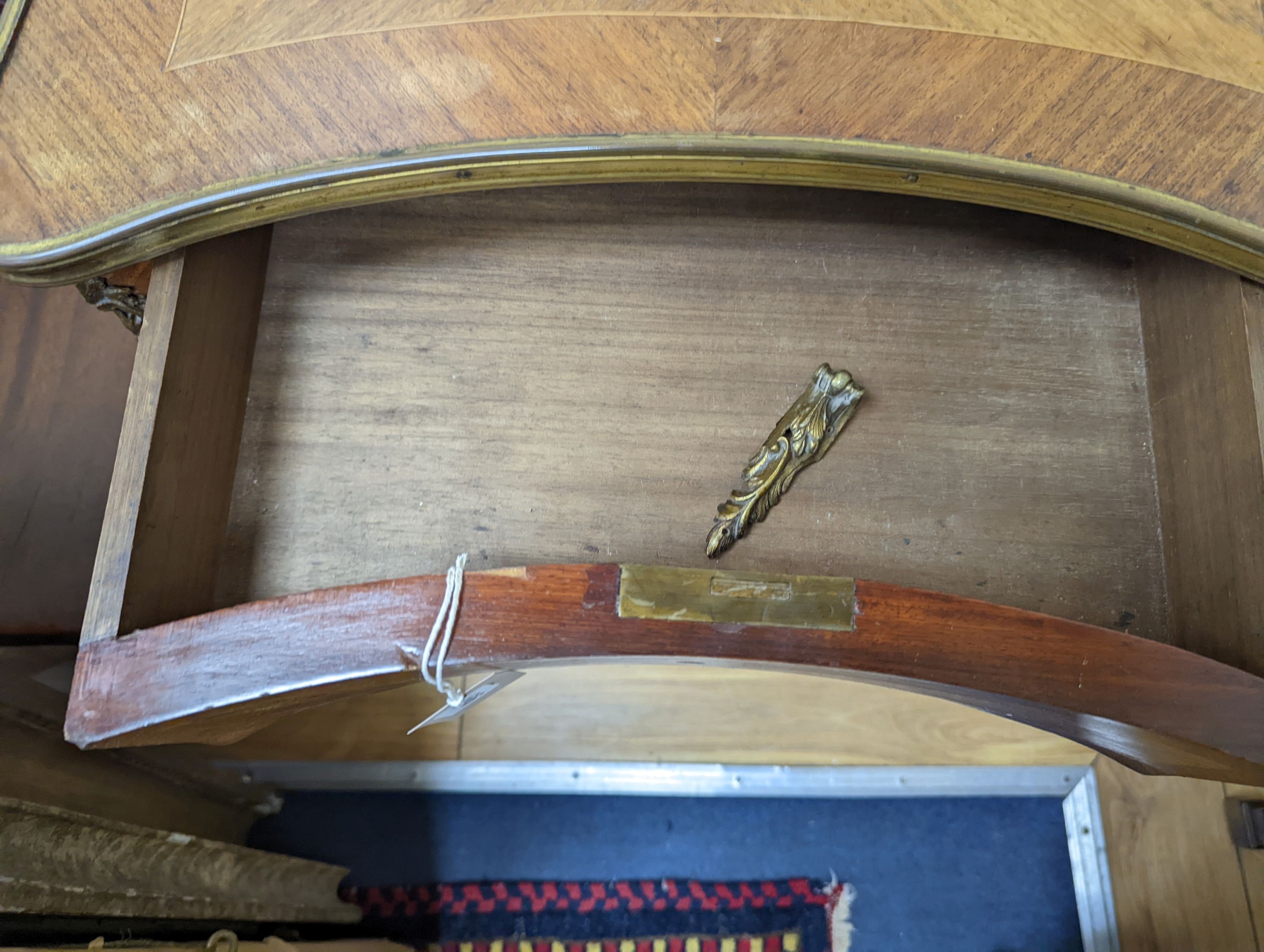 A Louis XV style Kingwood and marquetry inlaid gilt metal mounted two tier side table, width 58cm, depth 37cm, height 74cm